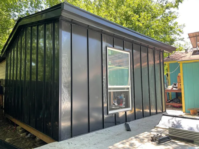 Black standing seam metal wall panels for Metal Roof Installation in Oakley