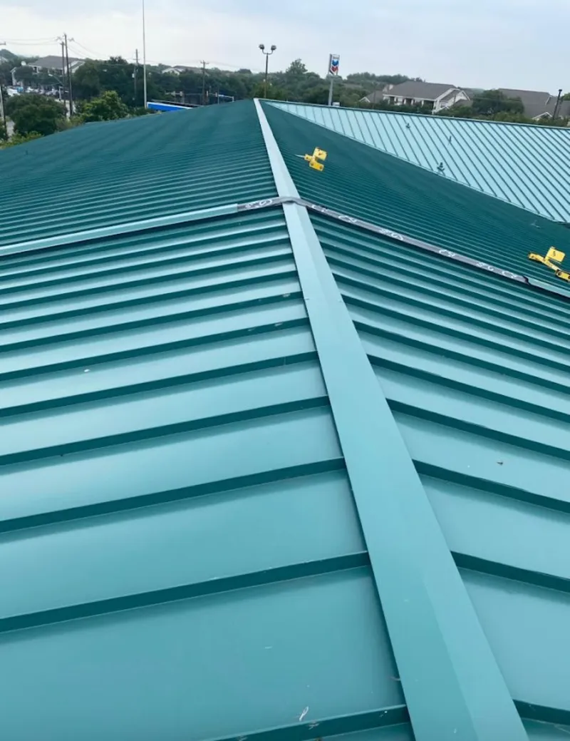 Green commercial metal roof ridge and valley for Metal Roof Repair in Oakley